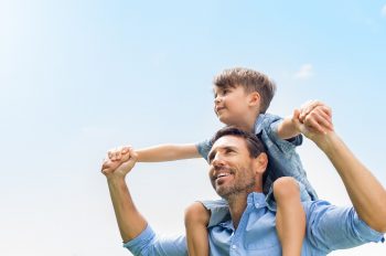 kid on shoulders